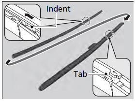 5. Slide the new wiper blade onto the holder