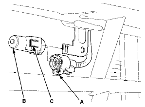 2. Lift the tab (C) to release the lock, then remove the