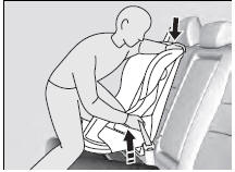 5. Grab the shoulder part of the seat belt near