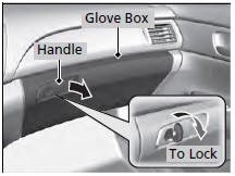 Pull the handle to open the glove box.