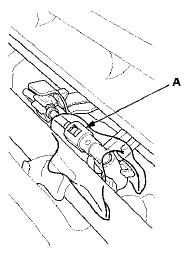 13. Disconnect the quick-connect fitting (A): Hold the