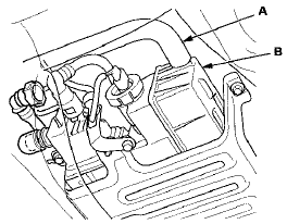 21. Reconnect the vacuum hose (engine side) t o the EVAP