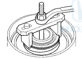 15. Remove the snap ring using snap ring pliers.