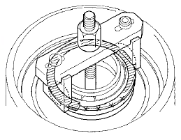 8. Compress the return spring until the snap ring can be