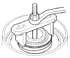 9. Install the snap ring using snap ring pliers.
