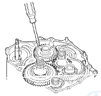 18. Install the transmission housing mounting bolts, and