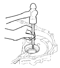 2. Remove the oil seal from the torque converter