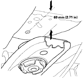 40. Carefully move the steering gearbox (A) toward the