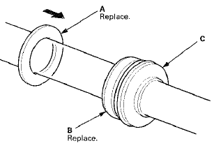 57. Apply steering grease to the steering rack teeth, then