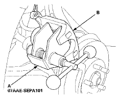 13. Press in the piston with the brake caliper piston