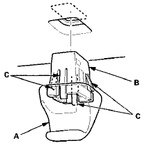 10. Connect the vanity mirror light connector (A), and