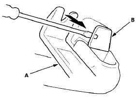 3. Pinch the clips (A) to release the hooks (B), then