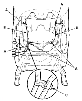 12. Pinch the tabs on the ends of the head restraint guides