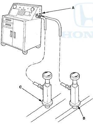 2. Measure the amount of refrigerant oil removed from