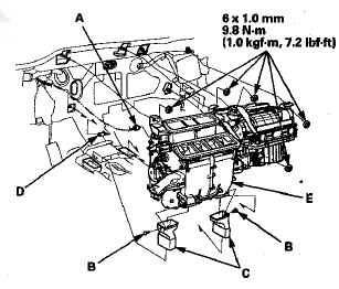 9. Remove the two screws, then remove the cover (A).