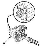 7. Remove the cover (A).