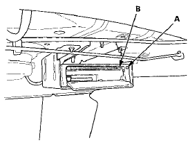 3. Press the EJECT button (B).