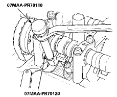 6. Tighten the locknut to the specified torque, and