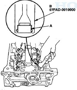 5. Install the valve spring and the spring retainer. Place