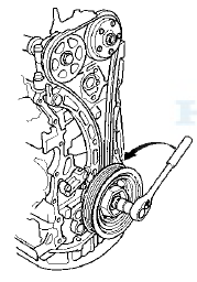 15. Align the holes on the lock (A) and the auto-tensioner