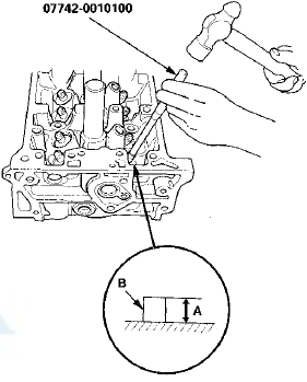 10. Coat both the valve guide reamer,-5.5 mm and the