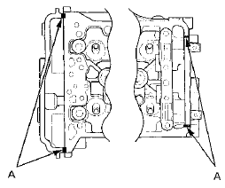 5. Set the spark plug seals (A) on the spark plug tubes.