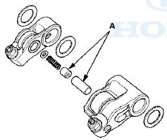 9. Reassemble the rocker arm assembly (see page 6-82).