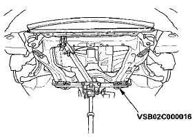 35. Raise the jack and line up the slots in the subframe