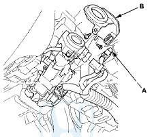 4. Remove the two screws and the immobilizer-keyless